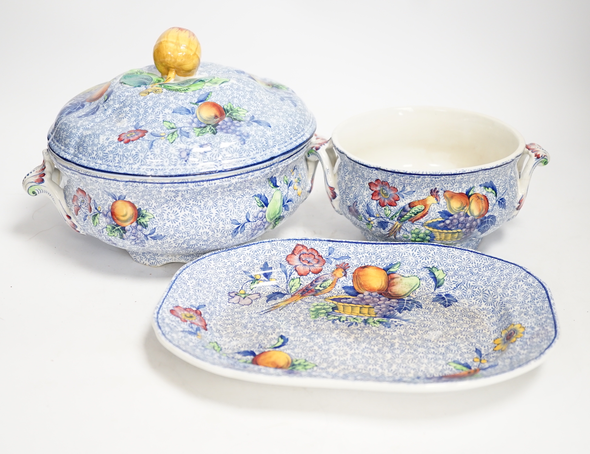 A large Copeland Spode’s George III pattern dinner service including tureens, rectangular platters and dinner plates, largest 36cm wide